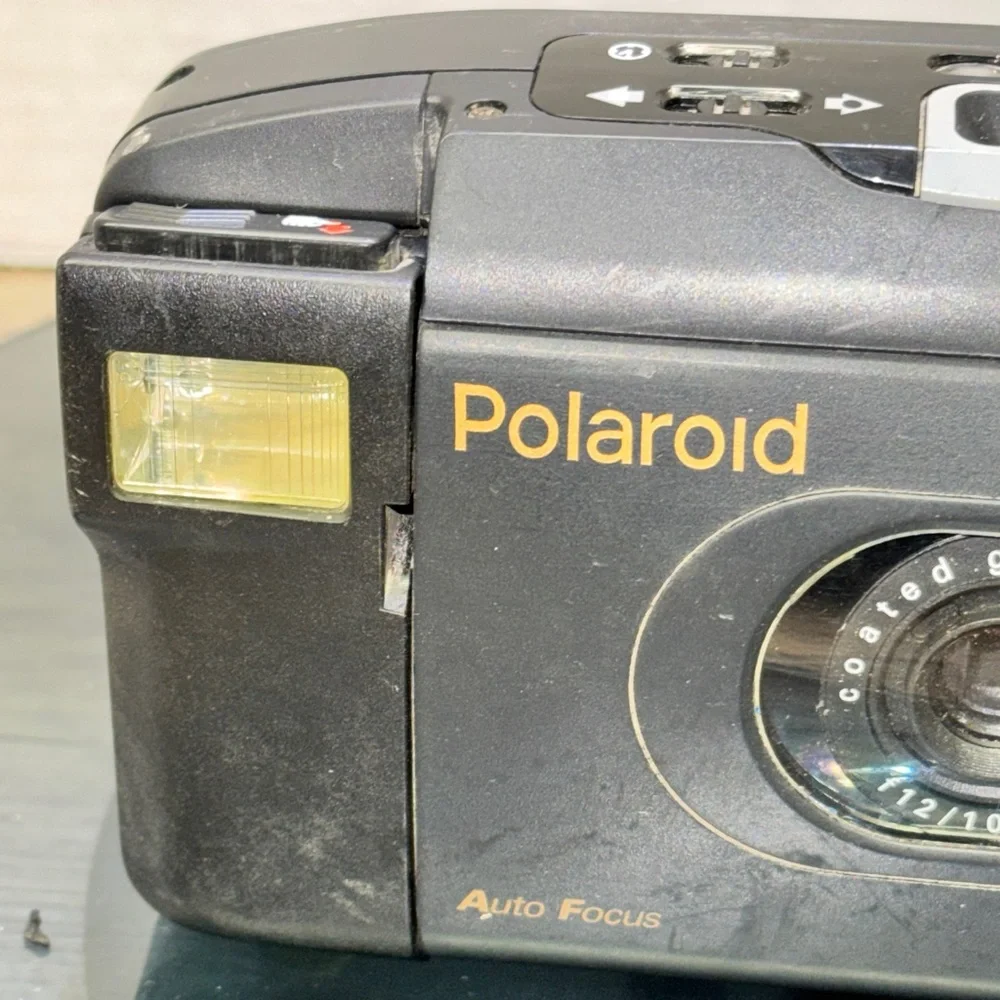 Vintage Polaroid Captiva SLR SE Instant 95 Film Camera Auto Focus Black